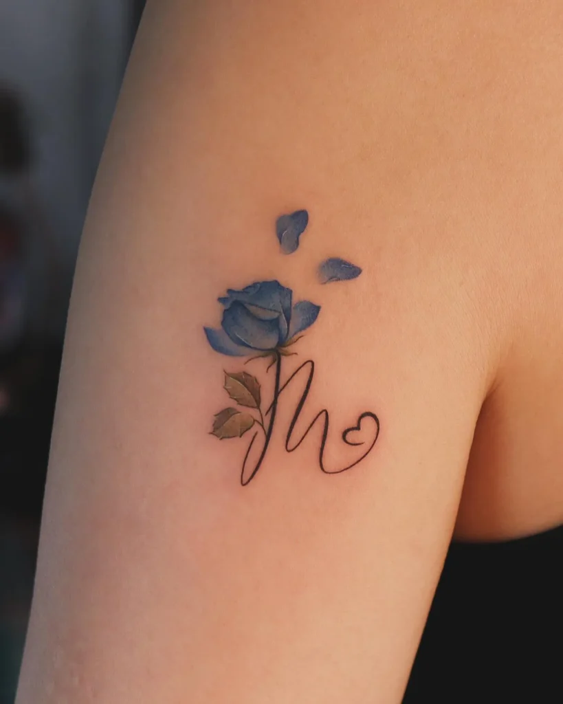 ### Blue Rose Whimsy Tattoo