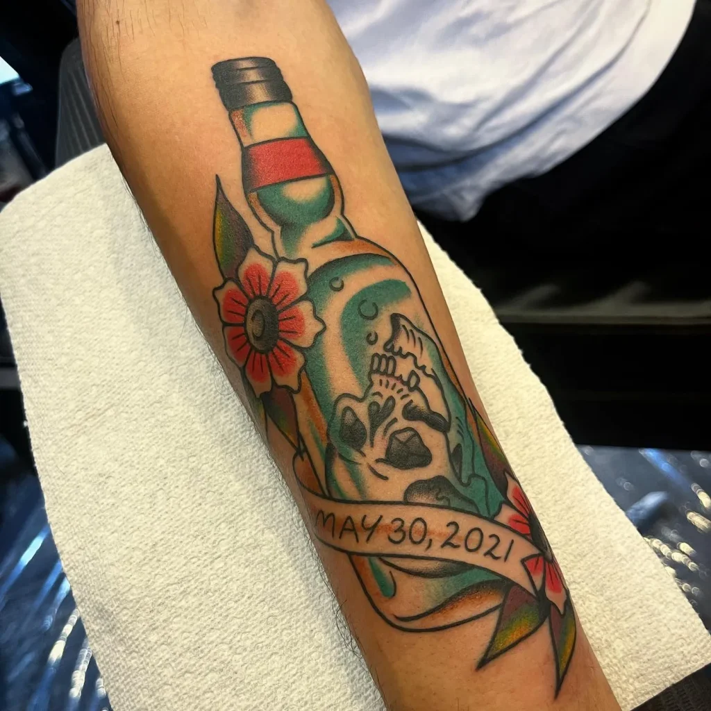 ### Bright Floral Bottle Tattoo