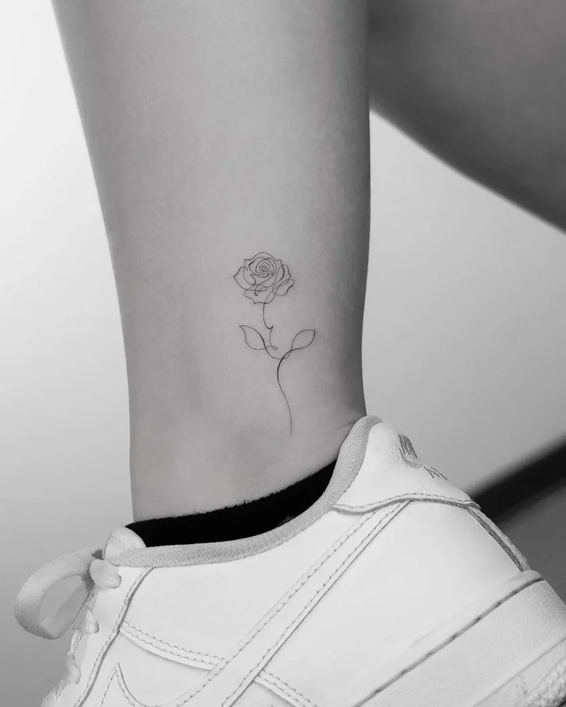 **Delicate Ankle Blossom Tattoo**