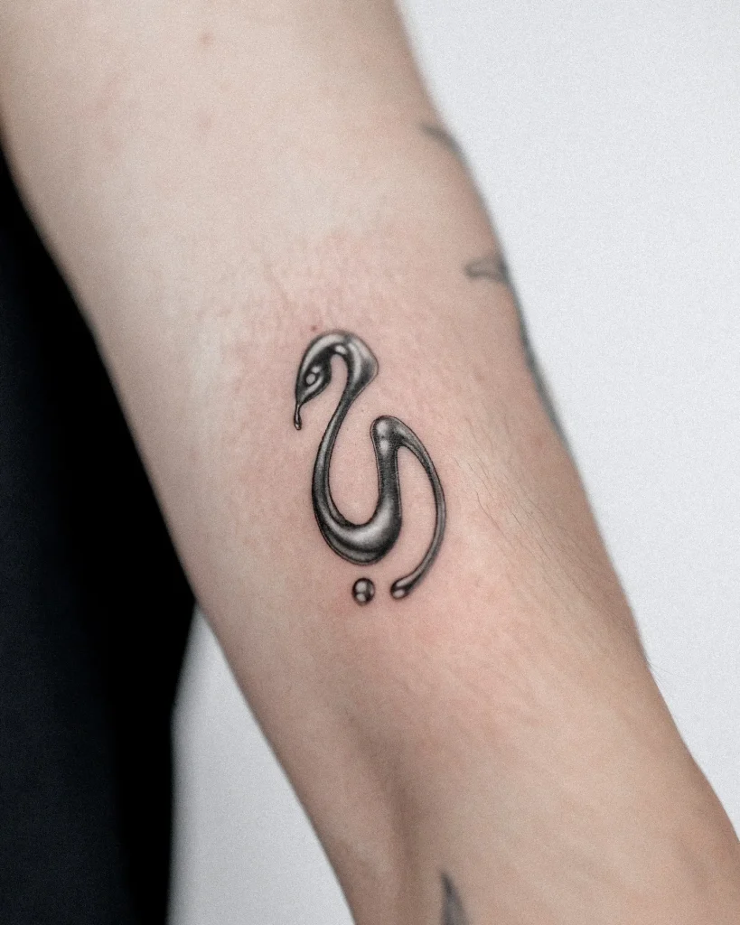 **Elegant Minimal Snake Tattoo**