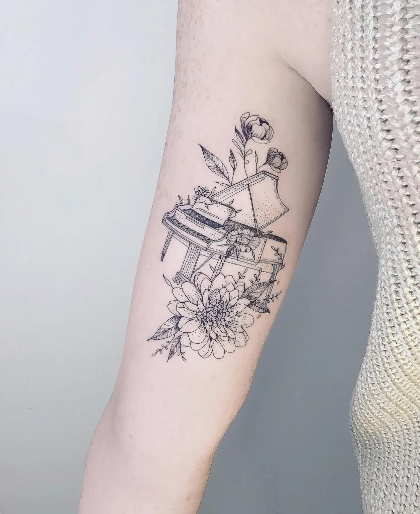 **Floral Piano Harmony Tattoo**