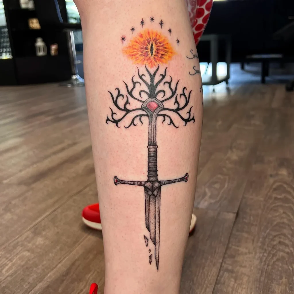 **Floral Tree Sword Tattoo**