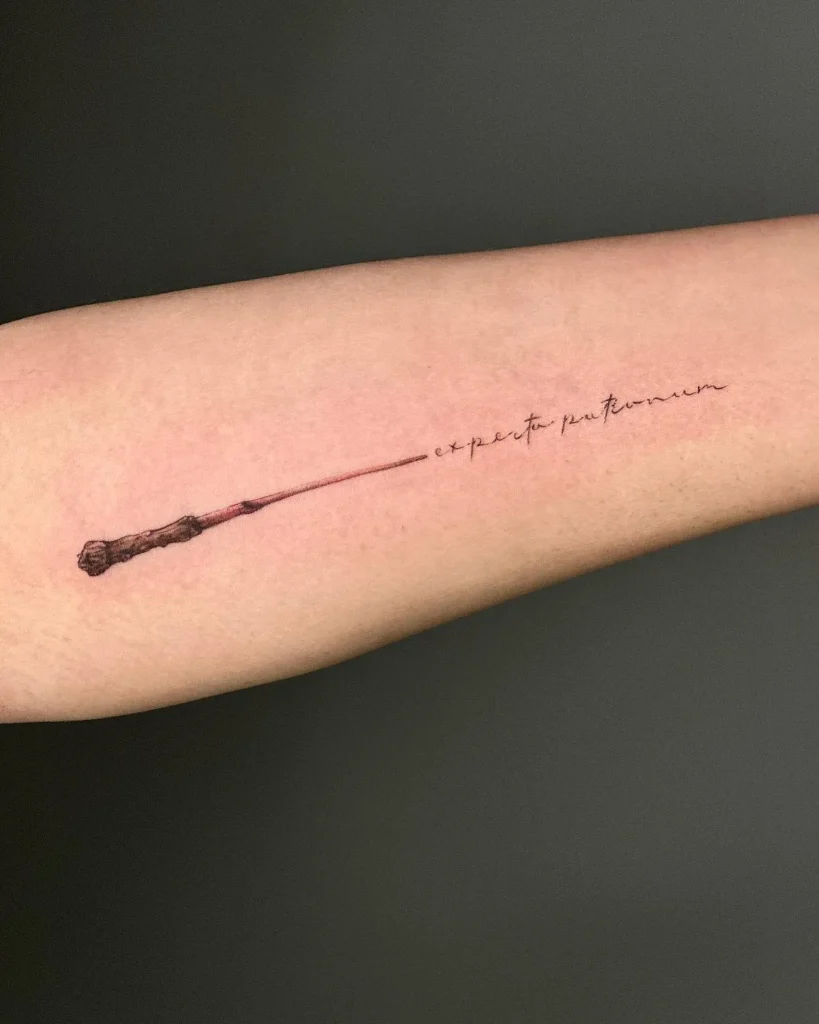 **Wand with Script Tattoo**