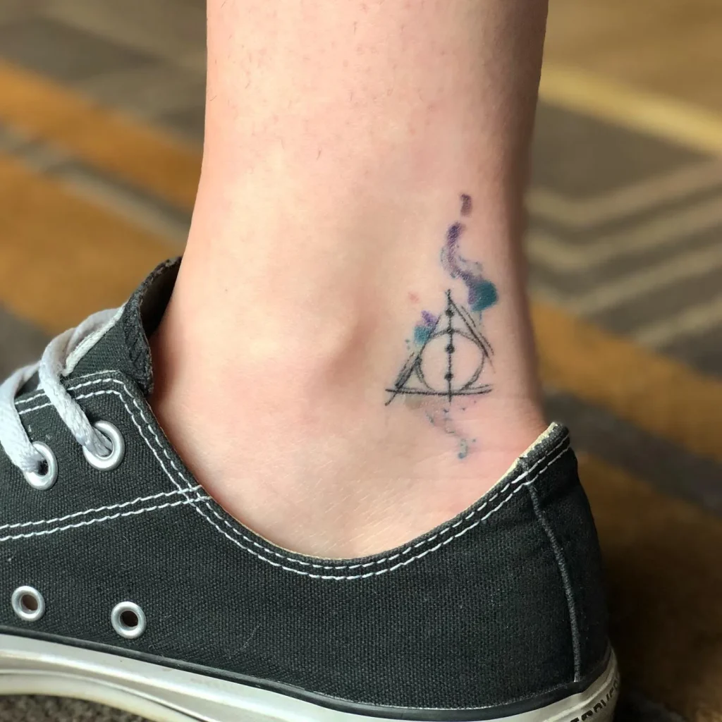 **Watercolor Deathly Hallows Tattoo**