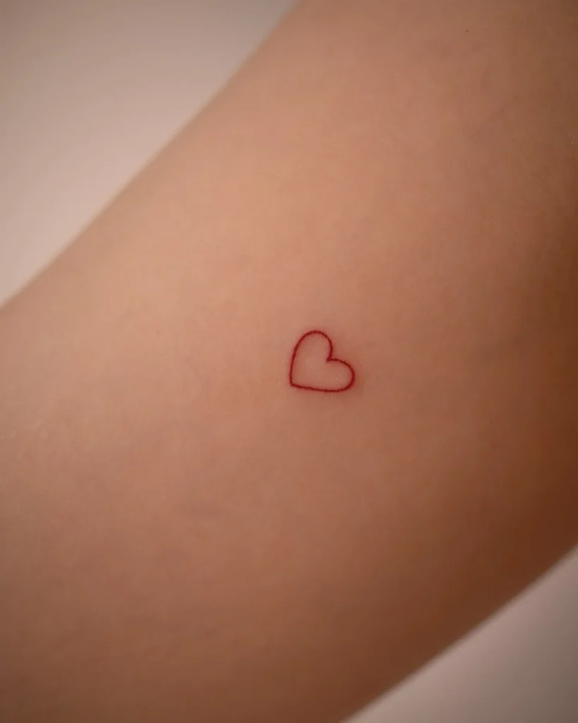 **Delicate Heart Outline Tattoo**