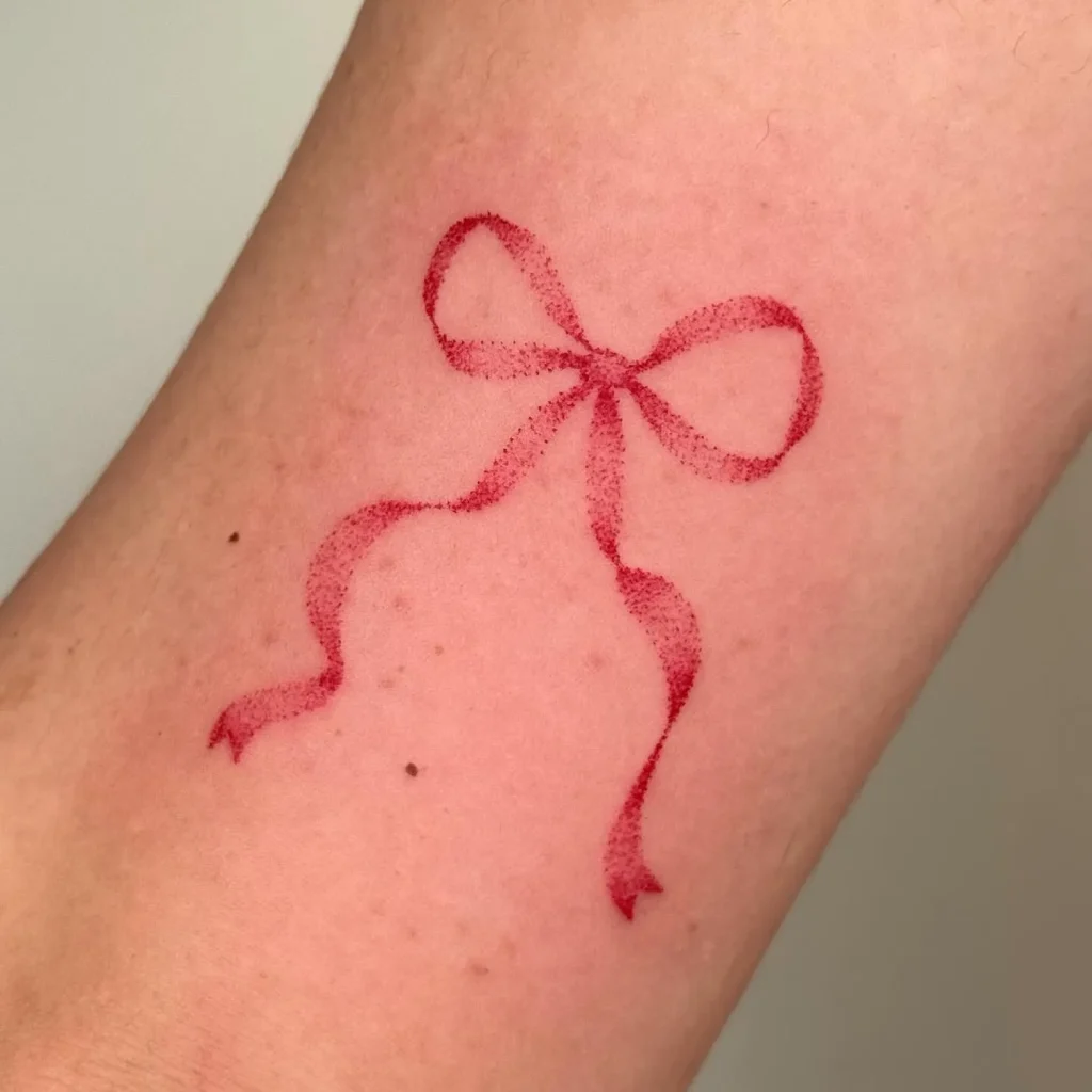 ### Delicate Ribbon Grace Tattoo