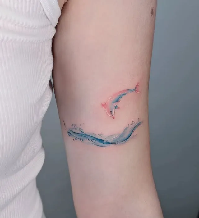 ### Dolphin in Waves Tattoo