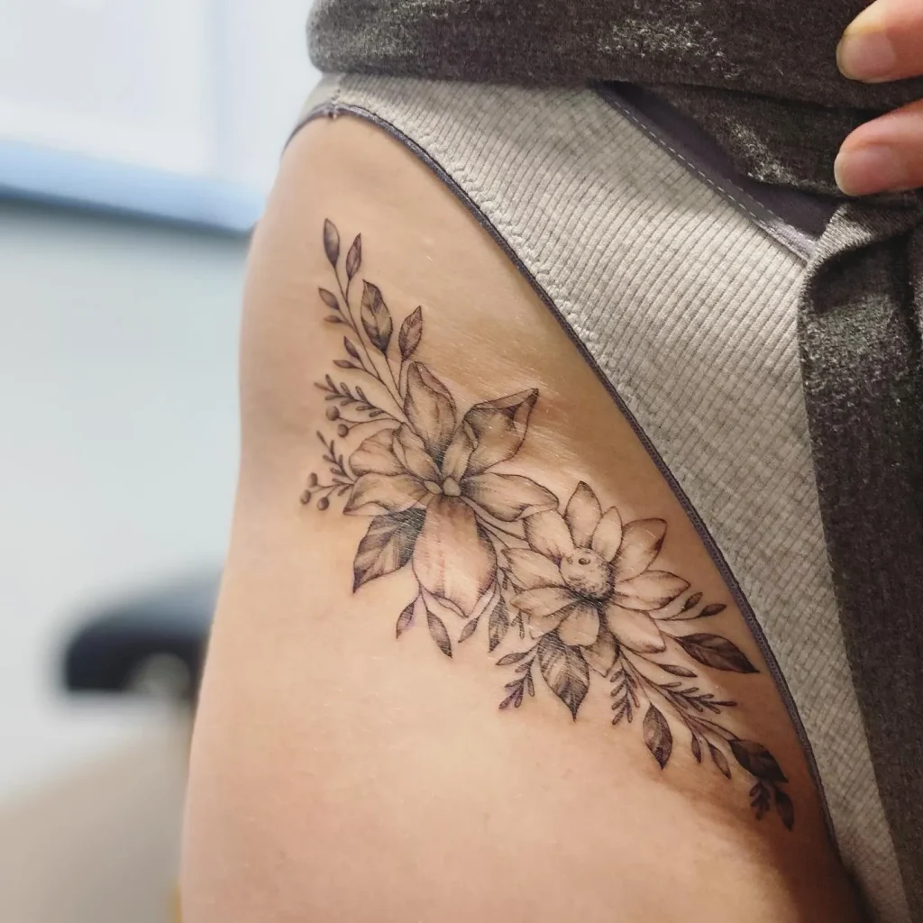 **Floral Hip Accent Tattoo**