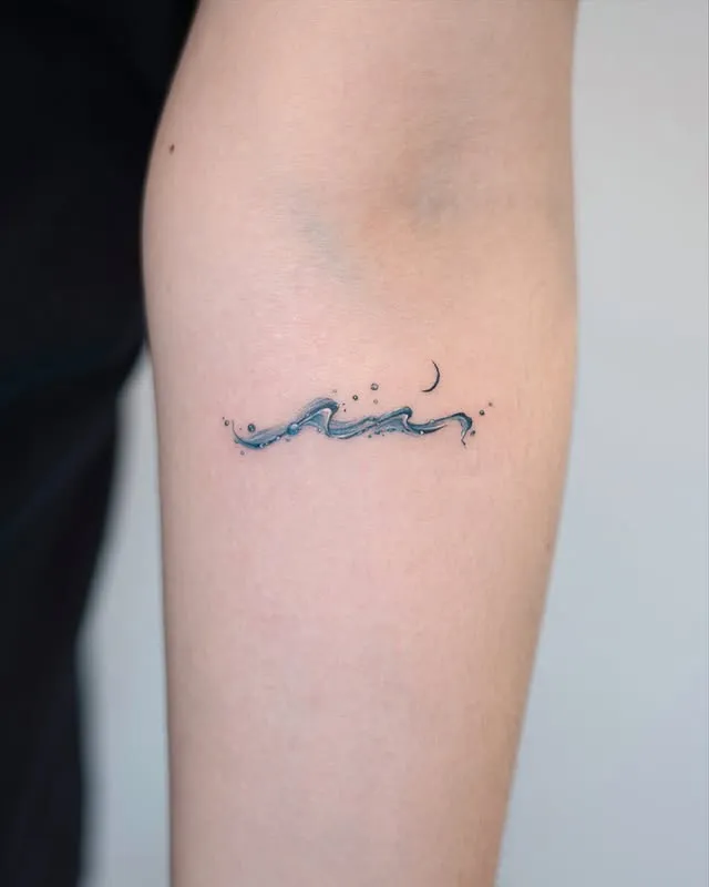 ### Gentle Ocean Wave Tattoo