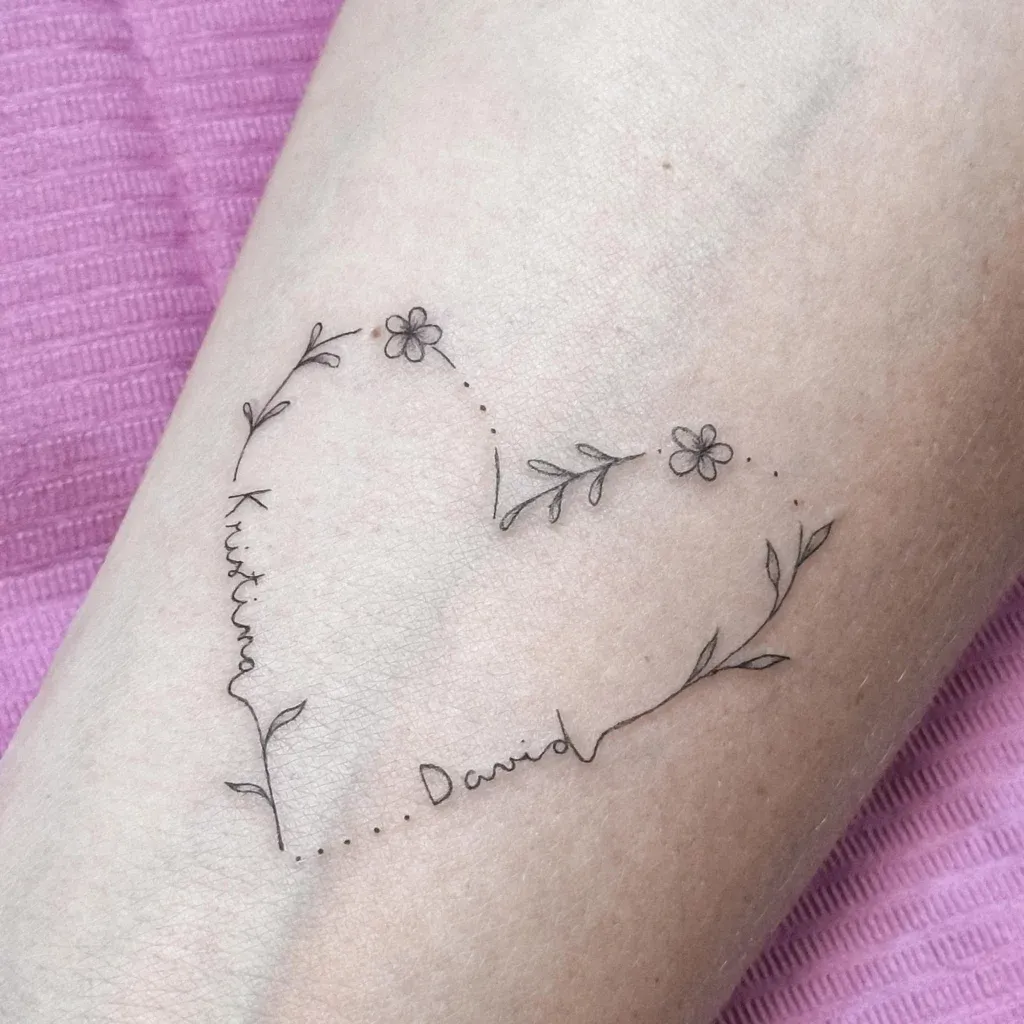 **Heartfelt Floral Connection Tattoo**