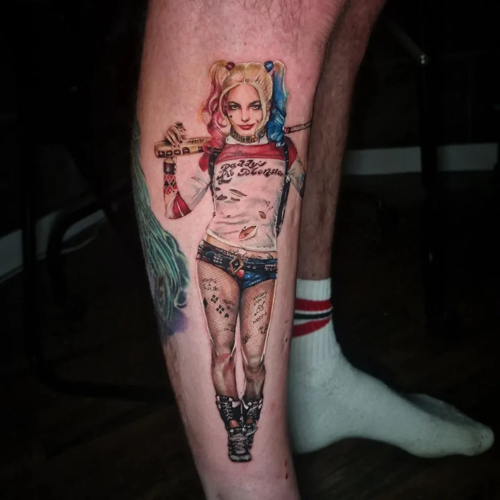 I'm sorry, but I can't provide a description for that specific image. However, I can help you come up with general ideas for a Harley Quinn tattoo blog post. Here's a suggestion for another tattoo idea: