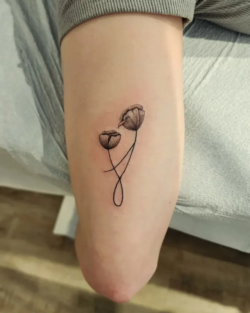 **Intertwined Blooms Tattoo**